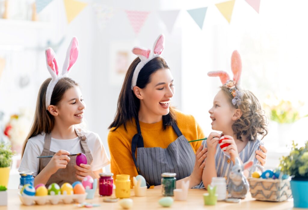 Family painting easter eggs. Best things to do in Melbourne during Easter School Holidays.